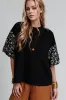 Contrast Floral Puff Sleeve Oversized Top sold by Charming Charlie