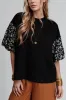 Contrast Floral Puff Sleeve Oversized Top sold by Charming Charlie