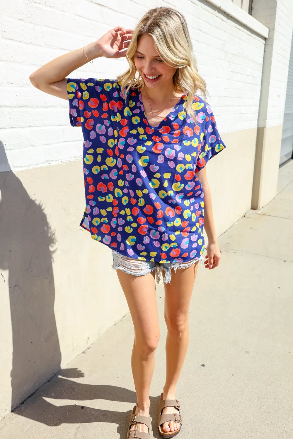 Follow Me Navy Blue Animal Print V Neck Dolman Hi-Lo Blouse sold by Charming Charlie product image thumbnail 4