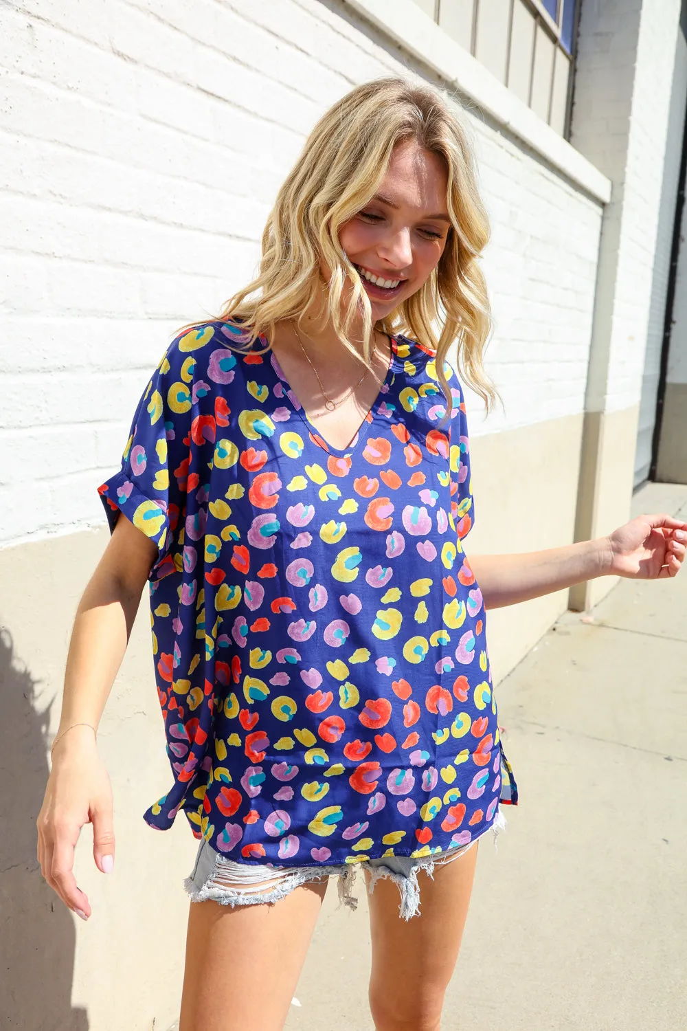 Follow Me Navy Blue Animal Print V Neck Dolman Hi-Lo Blouse sold by Charming Charlie product image thumbnail 2