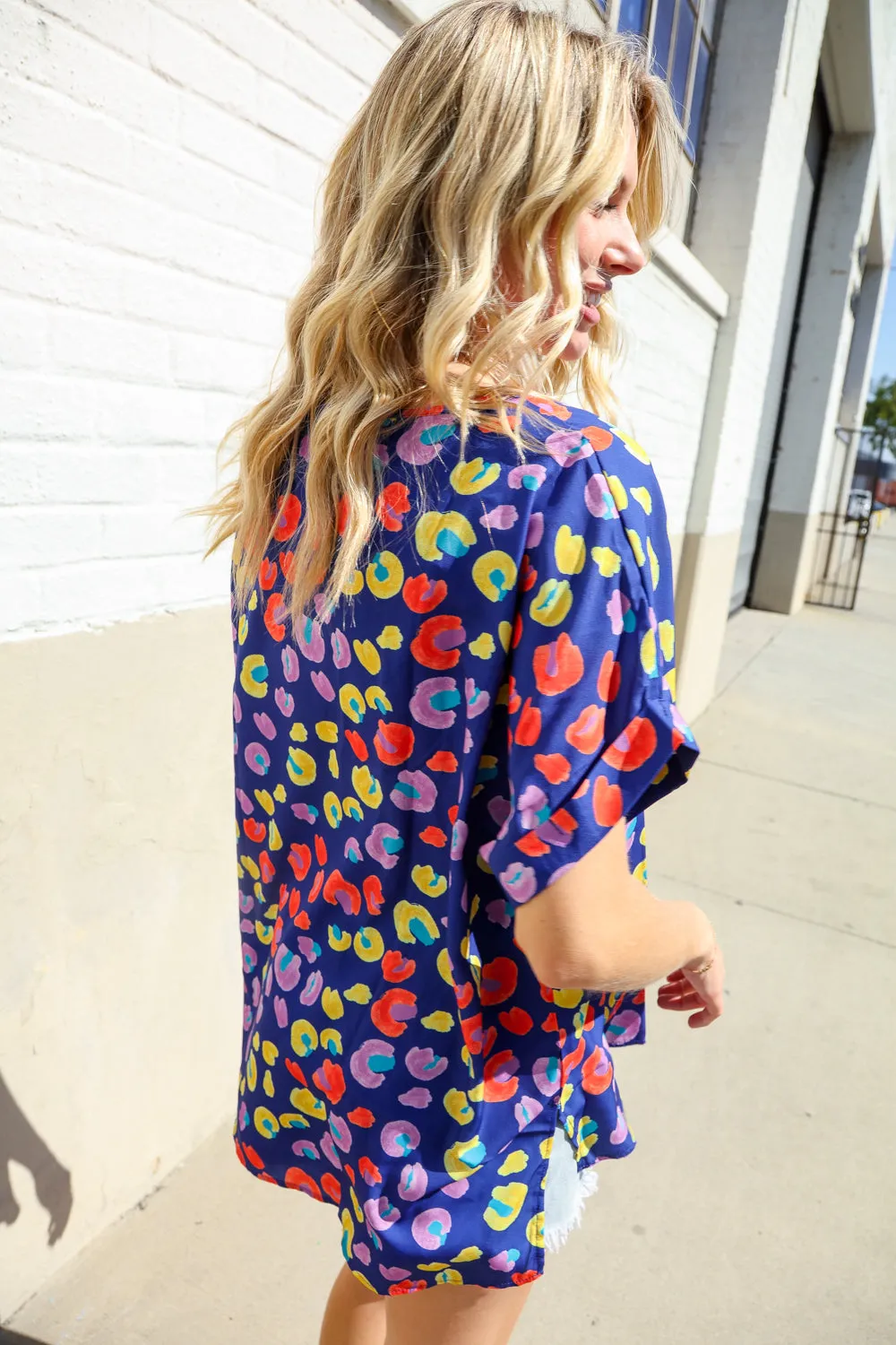 Follow Me Navy Blue Animal Print V Neck Dolman Hi-Lo Blouse sold by Charming Charlie product image thumbnail 3