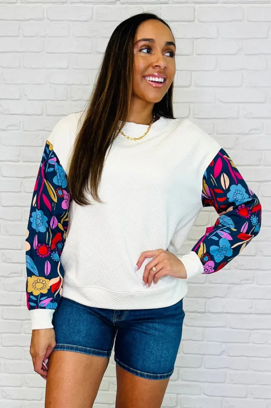 Sing a Melody Floral Sleeve Top sold by Charming Charlie