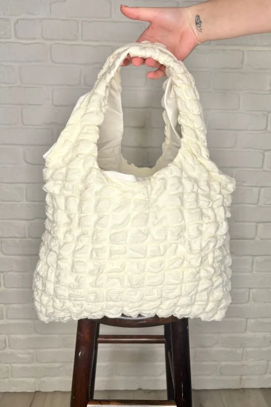 Day Out Cloud Tote Bag In Cream sold by Charming Charlie