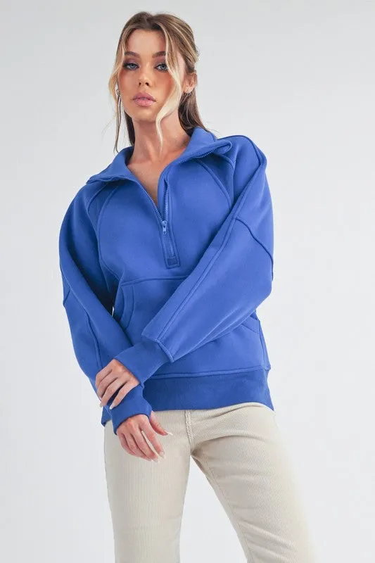 Aemi + Co Half Zip Raglan Sleeve Sweatshirt with Kangaroo Pocket sold by Charming Charlie
