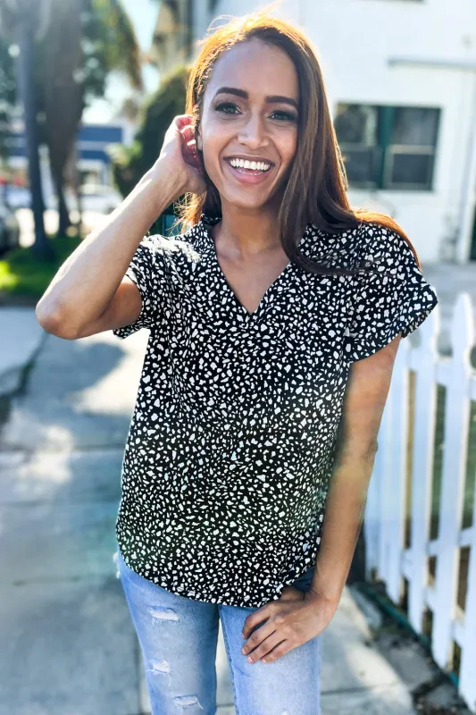 Feeling Bold Black Animal Print Short Sleeve Top sold by Charming Charlie