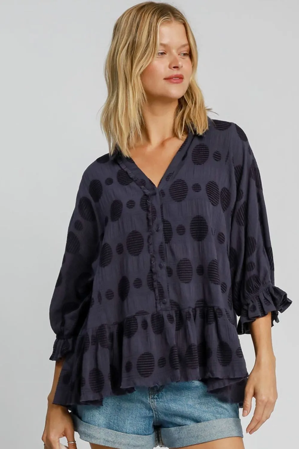 Umgee Full Size Swiss Dot Half Button Flounce Sleeve Blouse Plus Size sold by Charming Charlie