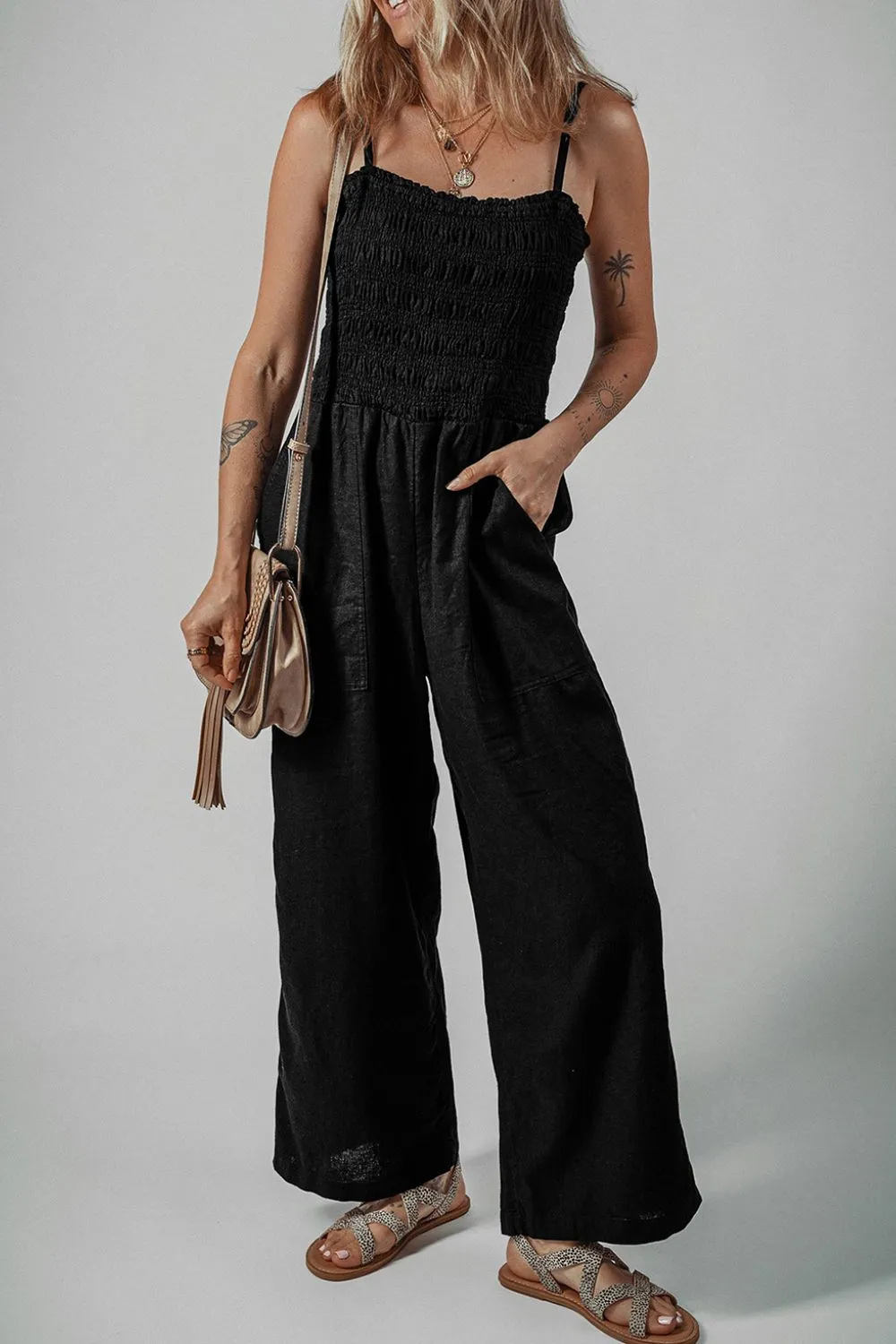 Smocked Spaghetti Straps Wide Leg Jumpsuit sold by Charming Charlie