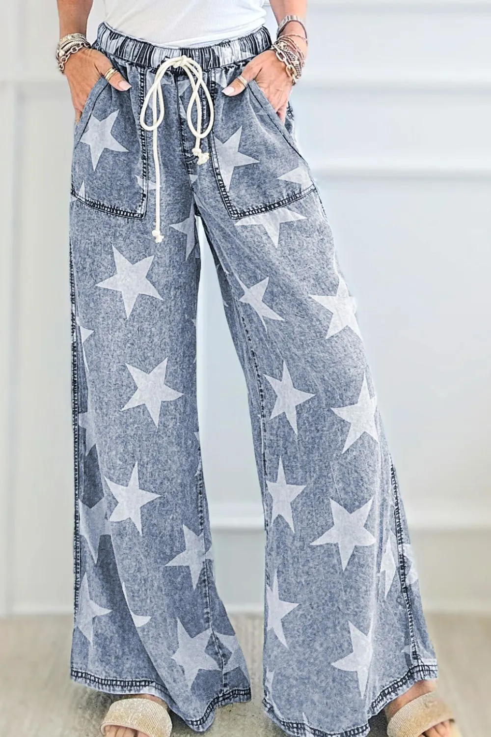 Star Print Washed Drawstring High Waist Wide Leg Jeans sold by Charming Charlie