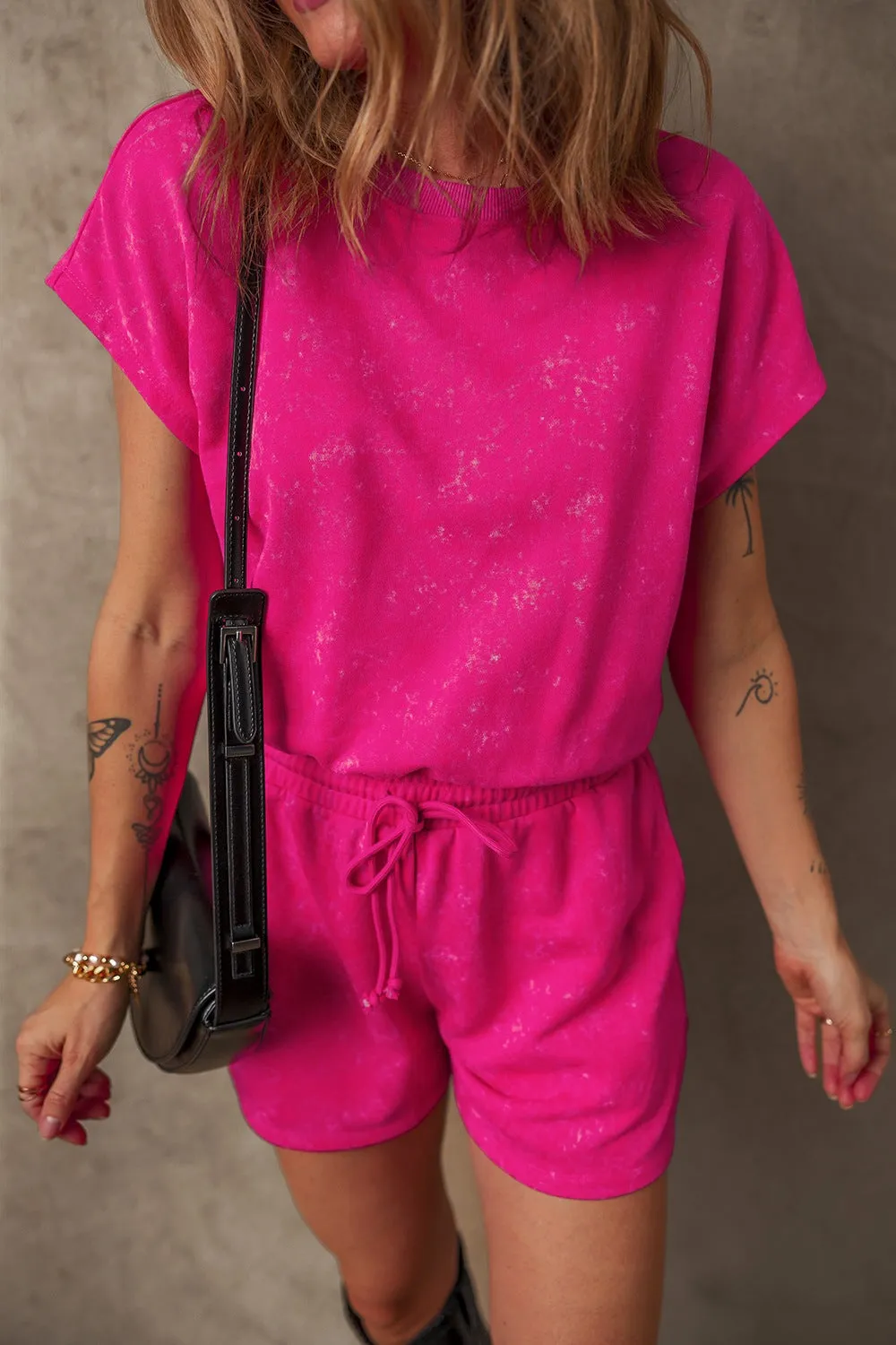 Mineral Wash Hollow Out Back Drawstring Waist Romper sold by Charming Charlie