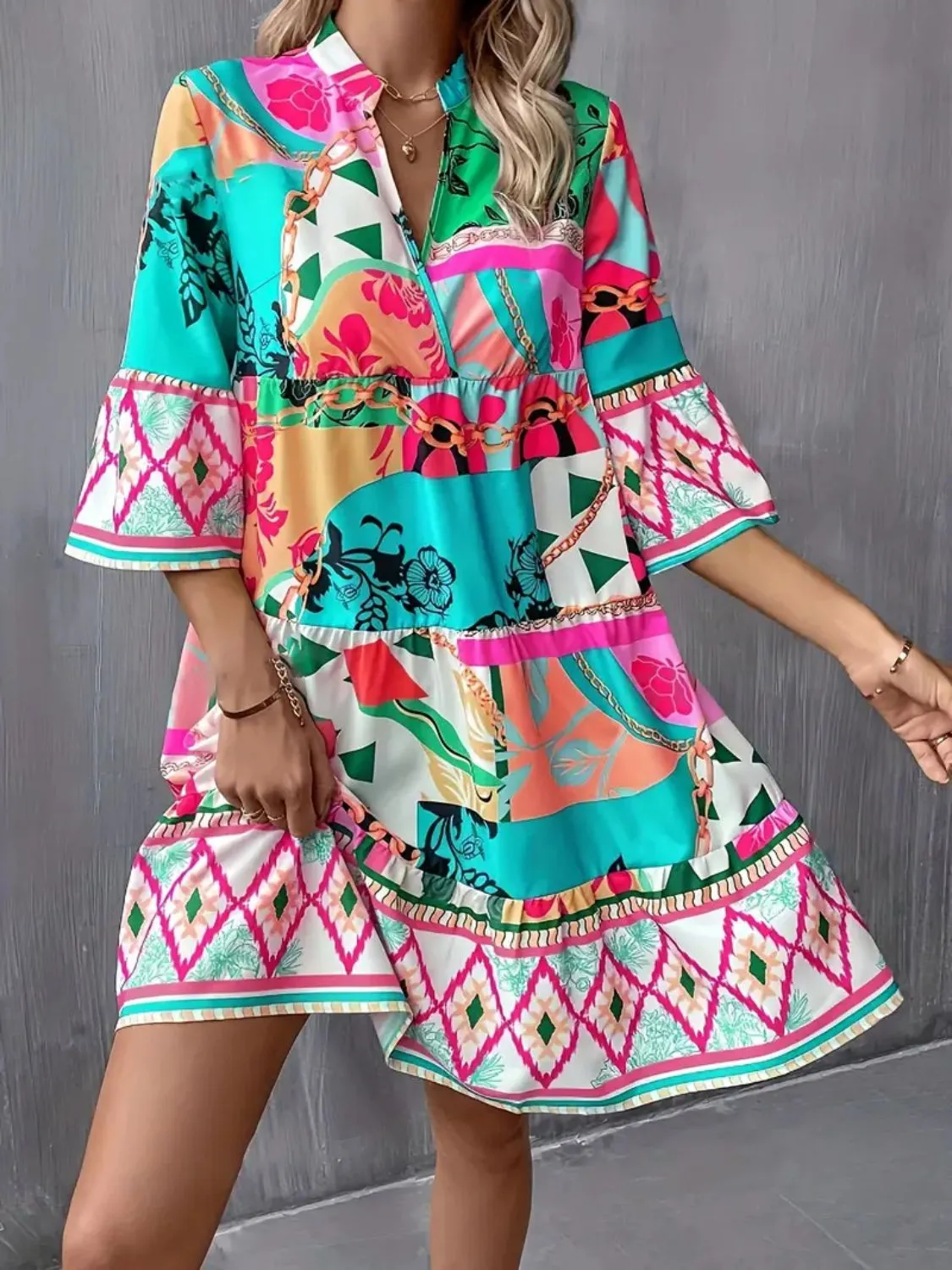 Printed Notched 3/4 Sleeve Tiered Dress sold by Charming Charlie