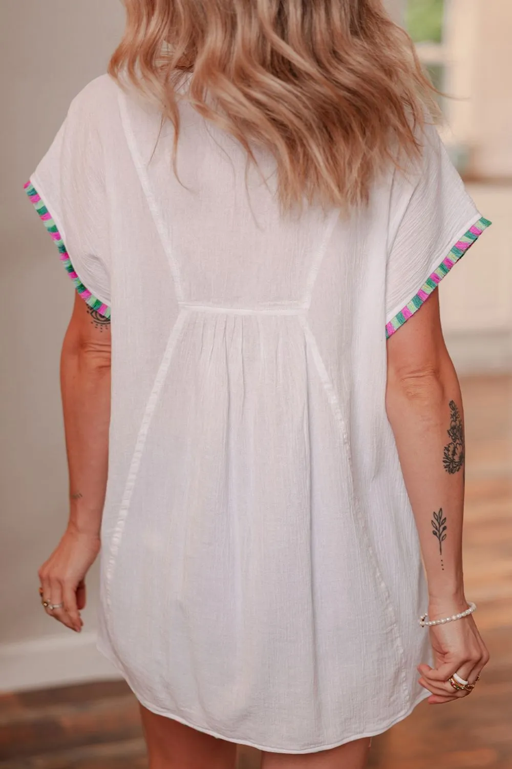 Tassel Tie Neck Short Sleeve Blouse sold by Charming Charlie product image thumbnail 3