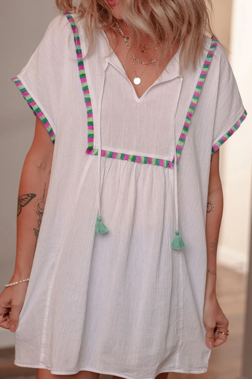 Tassel Tie Neck Short Sleeve Blouse sold by Charming Charlie product image thumbnail 2