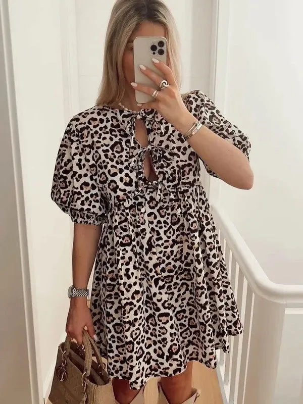 Leopard Bow Tie Front Dress sold by Charming Charlie