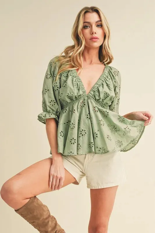 Aemi + Co Eyelet Embroidered V-Neck Half Sleeve Peplum Blouse sold by Charming Charlie product image thumbnail 3