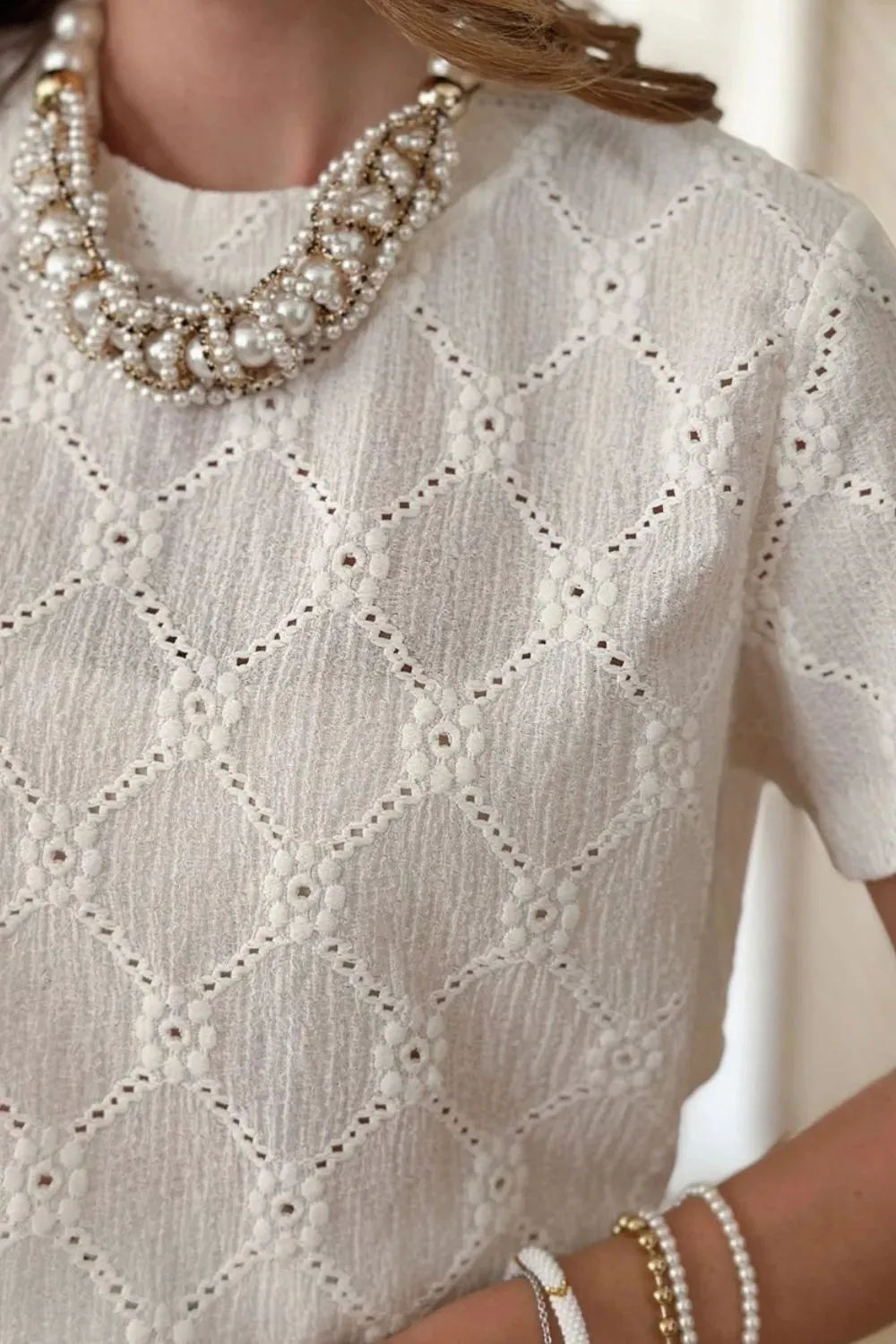 Eyelet Round Neck Short Sleeve Blouse sold by Charming Charlie product image thumbnail 3