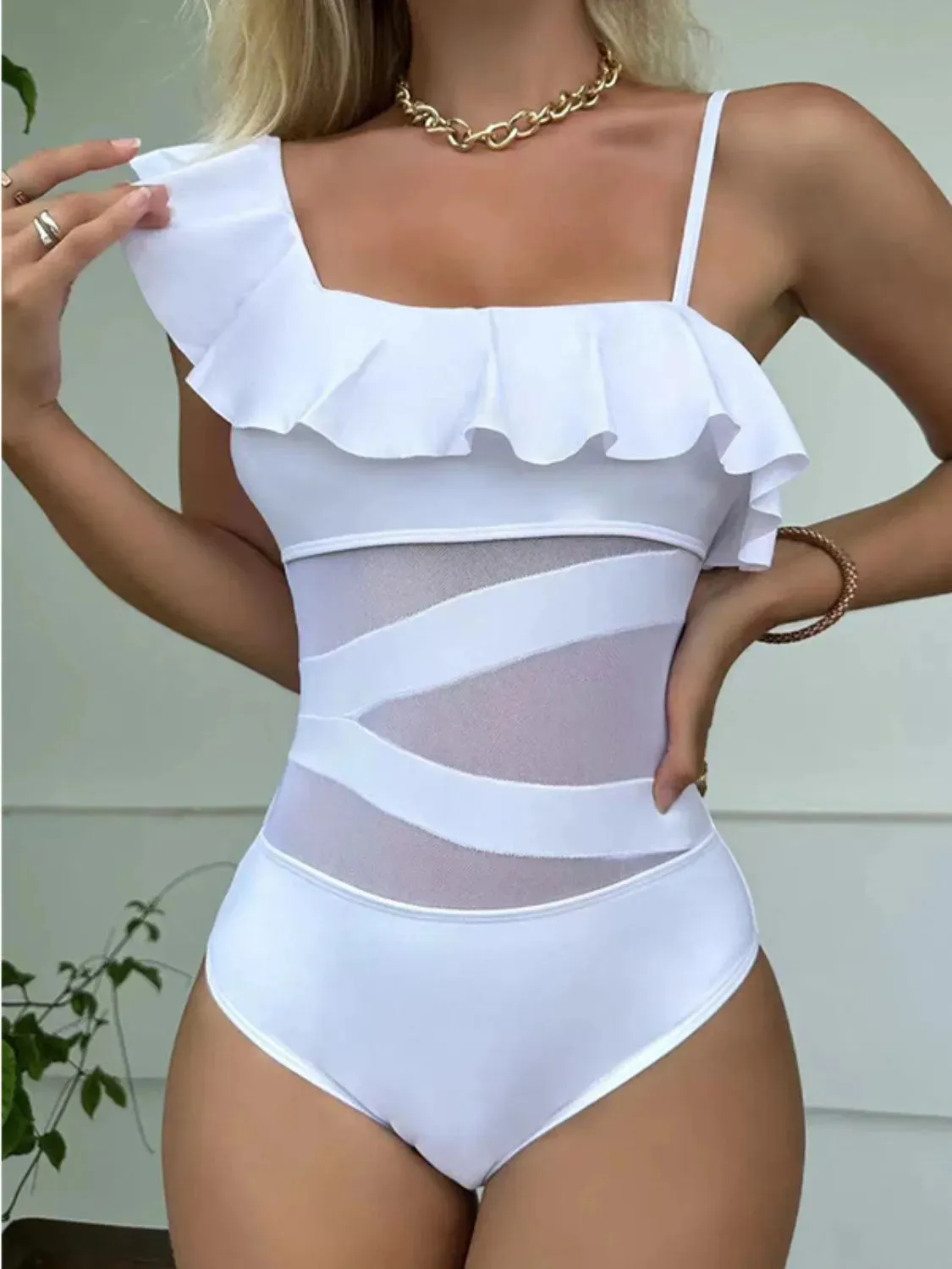 Asymmetrical Ruffled One-Piece Swimwear sold by Charming Charlie