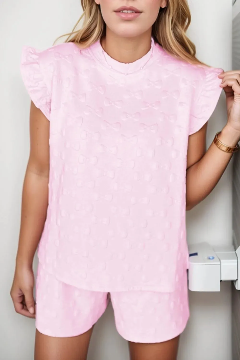 Bow Jacquard Ruffle Cap Sleeve Top and Shorts Set sold by Charming Charlie