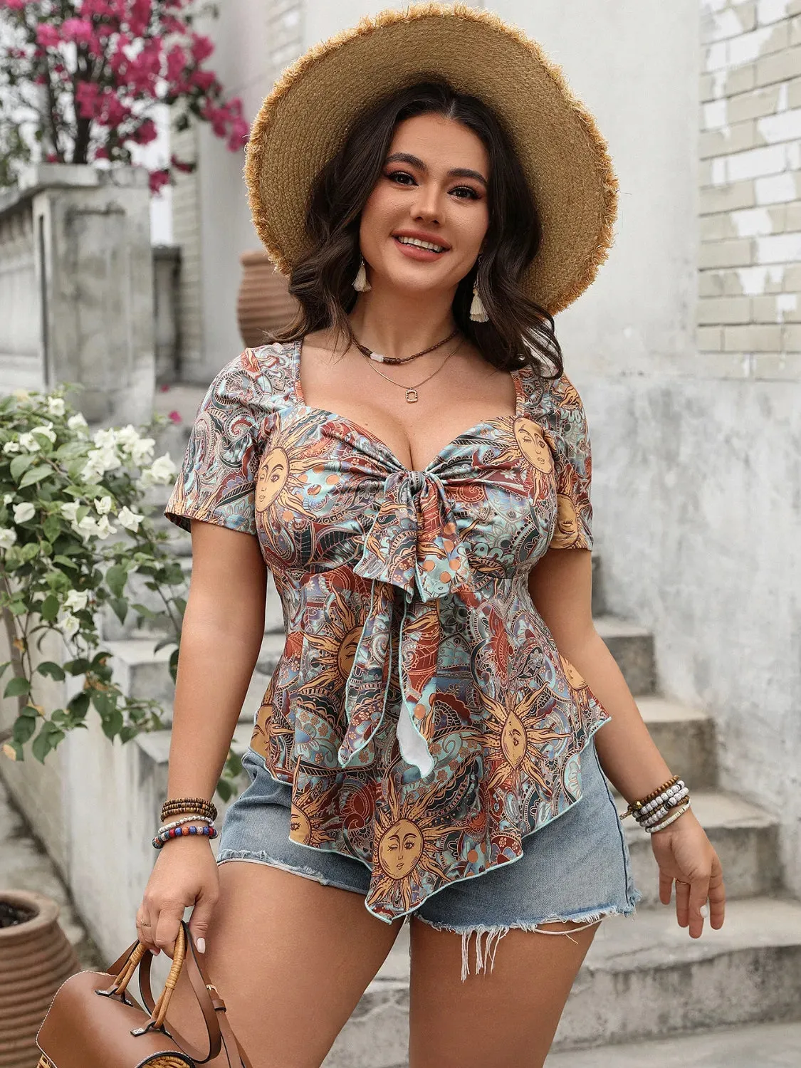 Plus Size Printed Sweetheart Neck Short Sleeve Blouse sold by Charming Charlie