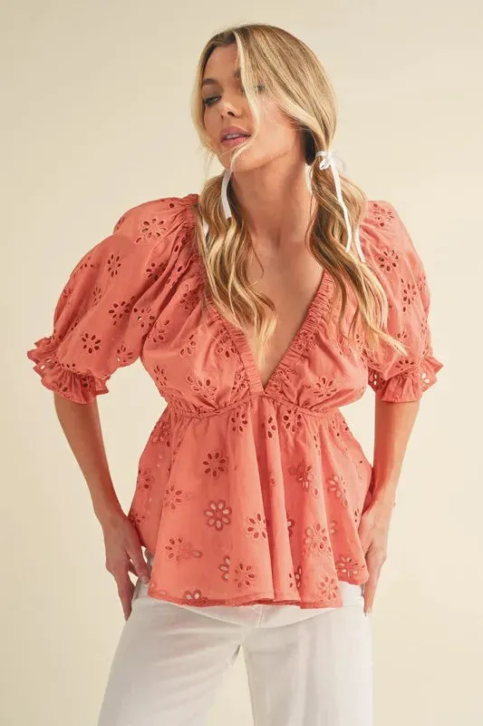 Aemi + Co Eyelet Embroidered V-Neck Half Sleeve Peplum Blouse sold by Charming Charlie