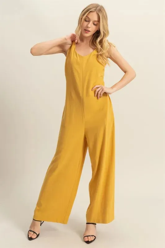 HYFVE Cutout Back Knotted Strap Wide Leg Jumpsuit sold by Charming Charlie
