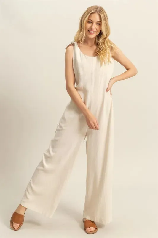 HYFVE Cutout Back Knotted Strap Wide Leg Jumpsuit sold by Charming Charlie
