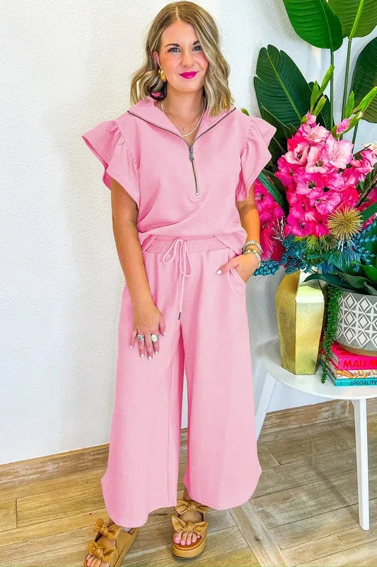 Ruffled Sleeve Zipped Top and Wide Leg Pants Set sold by Charming Charlie
