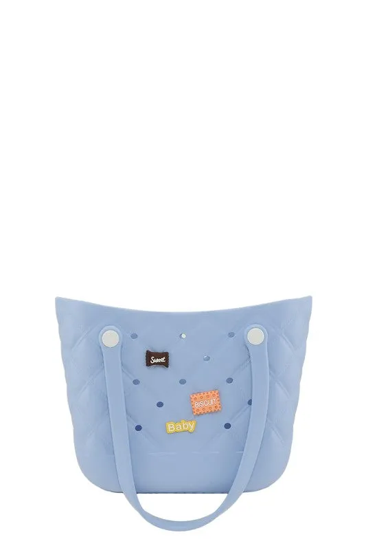 Small Rubber Tote Bag with Decorative Charms sold by Charming Charlie