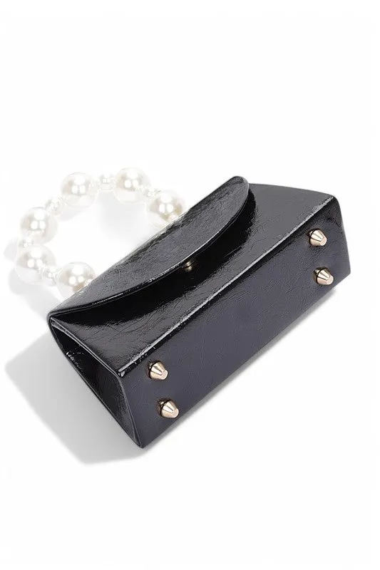 Pearl Handle Metallic Clutch Swing Bag sold by Charming Charlie product image thumbnail 5