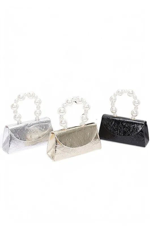 Pearl Handle Metallic Clutch Swing Bag sold by Charming Charlie product image thumbnail 4