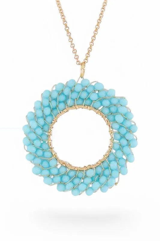 Beaded Hoop Pendant Necklace sold by Charming Charlie