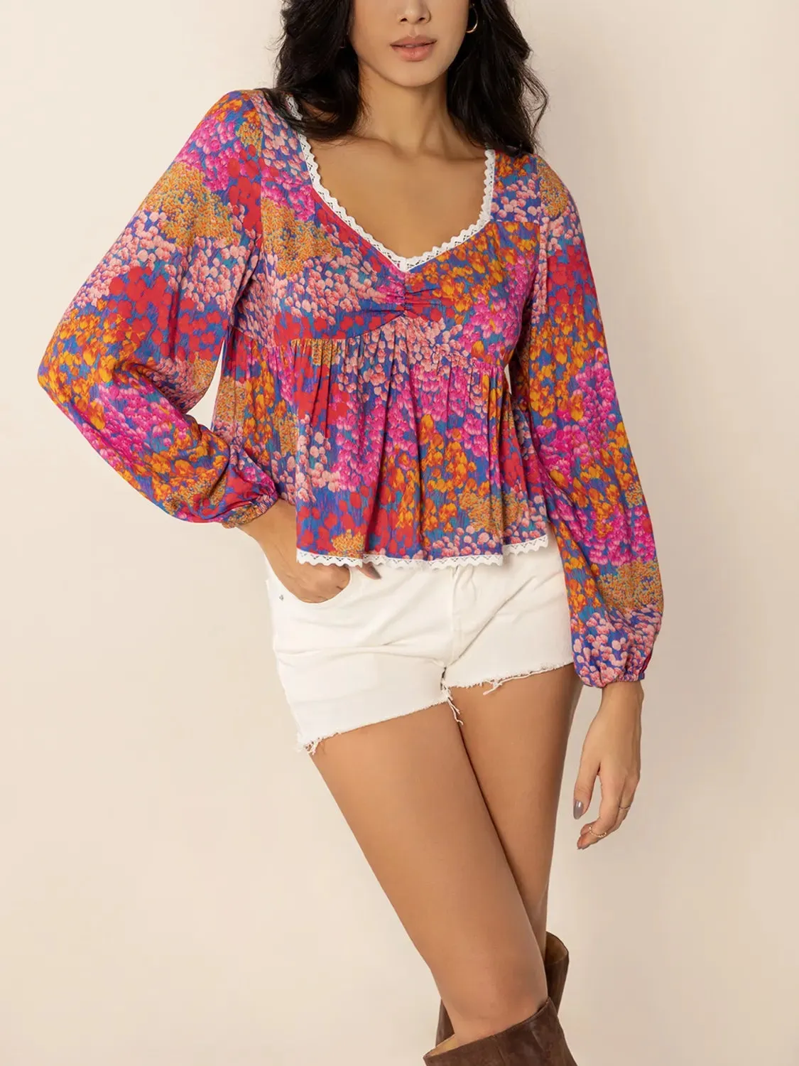 Lace Detail Printed Balloon Sleeve Top sold by Charming Charlie