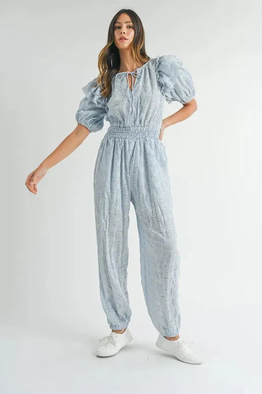 MABLE Eyelet Lace Ruffle Shoulder Jumpsuit sold by Charming Charlie