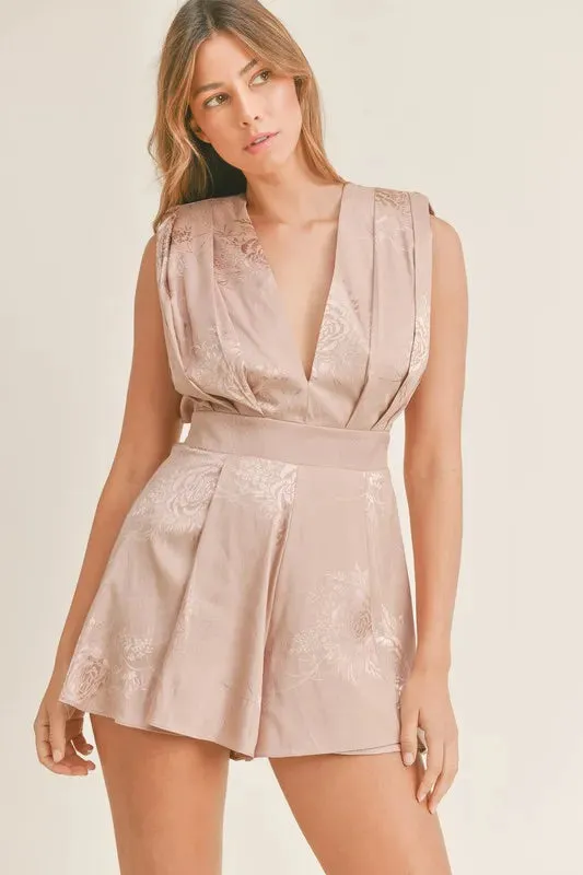 MABLE Draped Romper with Pleated Shoulder Pad Detail sold by Charming Charlie