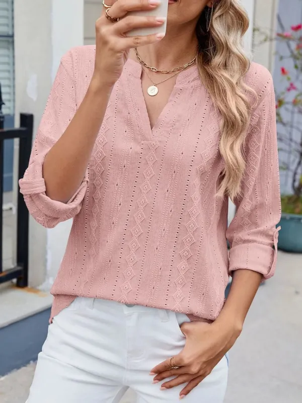 Eyelet Notched Roll-Tab Sleeve Top sold by Charming Charlie