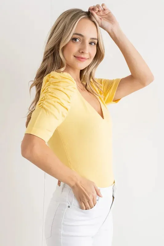 And The Why Shirring Puff Sleeve Bodysuit sold by Charming Charlie product image thumbnail 2