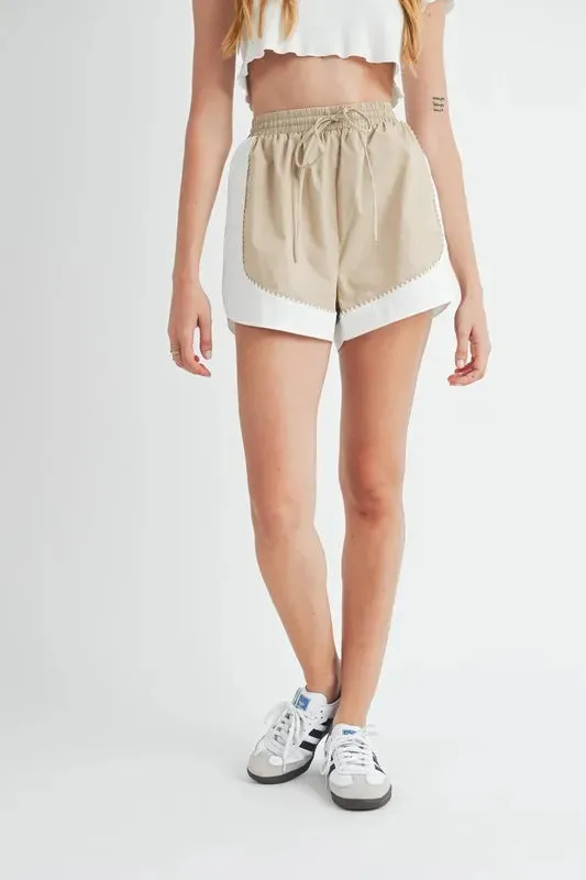 MABLE Drawstring Waist Contrast Trim Detail Shorts sold by Charming Charlie