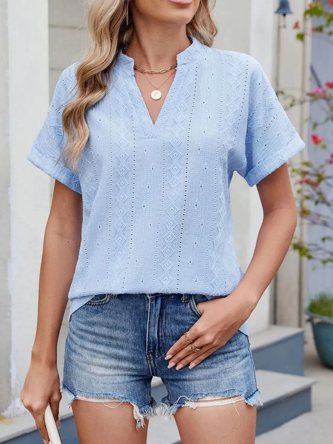 Eyelet Notched Short Sleeve Top sold by Charming Charlie product image thumbnail 2