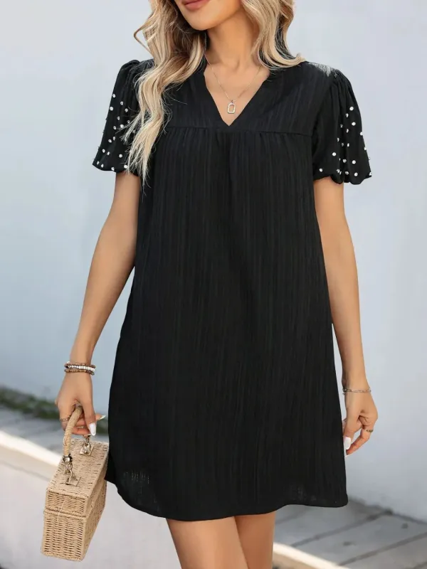 Textured V-Neck Short Sleeve Mini Dress sold by Charming Charlie
