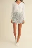 MABLE 3D Floral Embellished Applique Mini Skirt sold by Charming Charlie