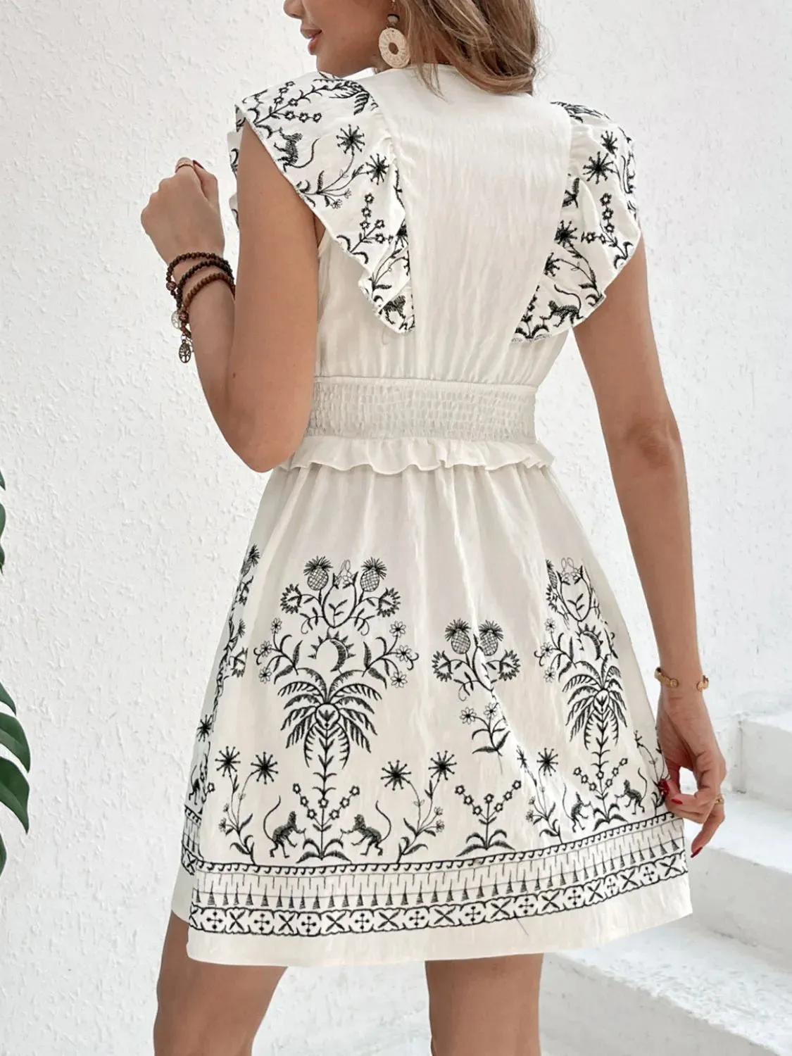 Smocked Ruffled Cap Sleeve Mini Dress sold by Charming Charlie product image thumbnail 2