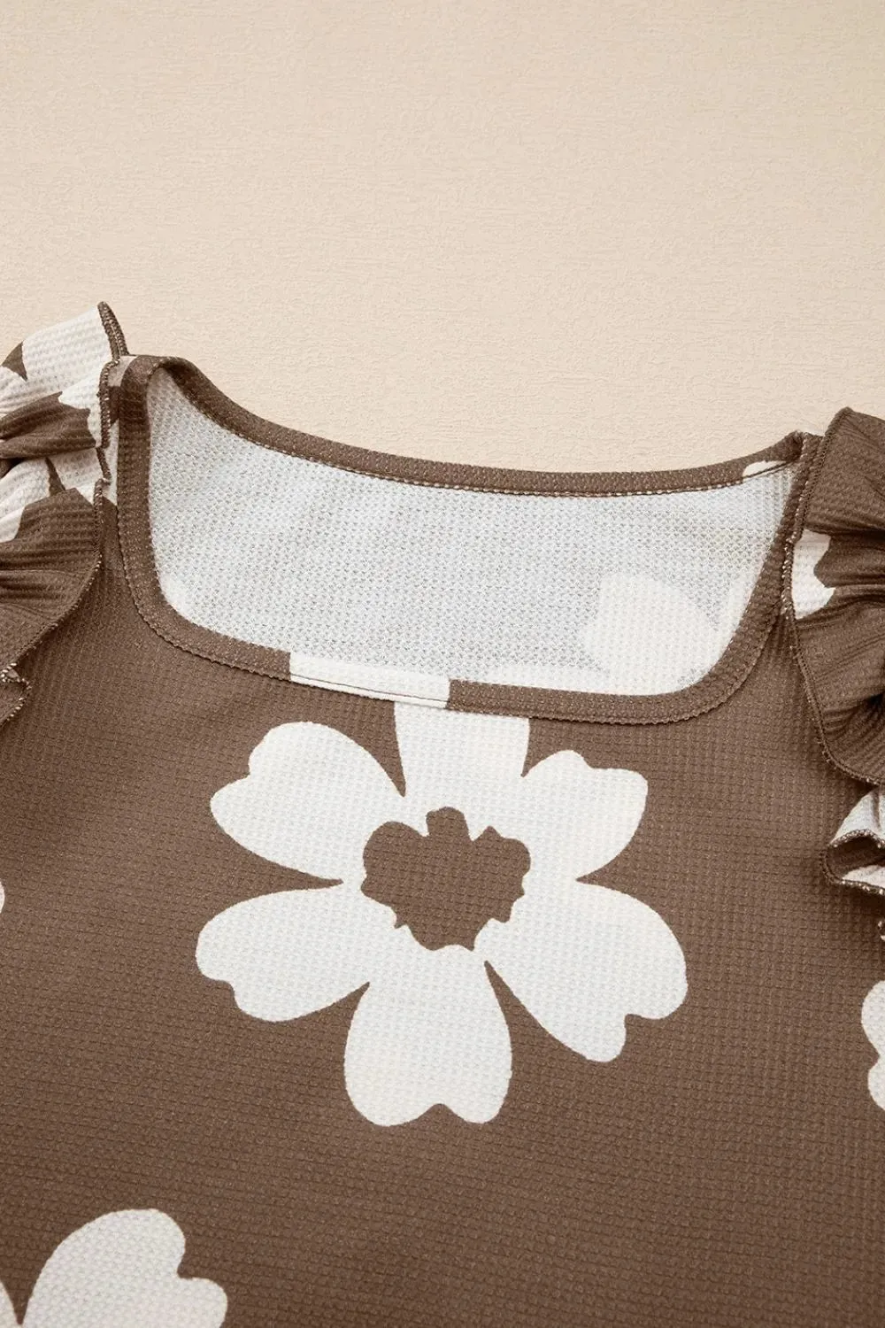 Floral Textured Ruffled Cap Sleeve Blouse sold by Charming Charlie product image thumbnail 5