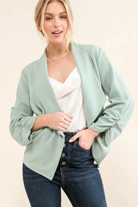 And The Why Stretch Non-Wrinkled Basic Open-Front Blazer sold by Charming Charlie