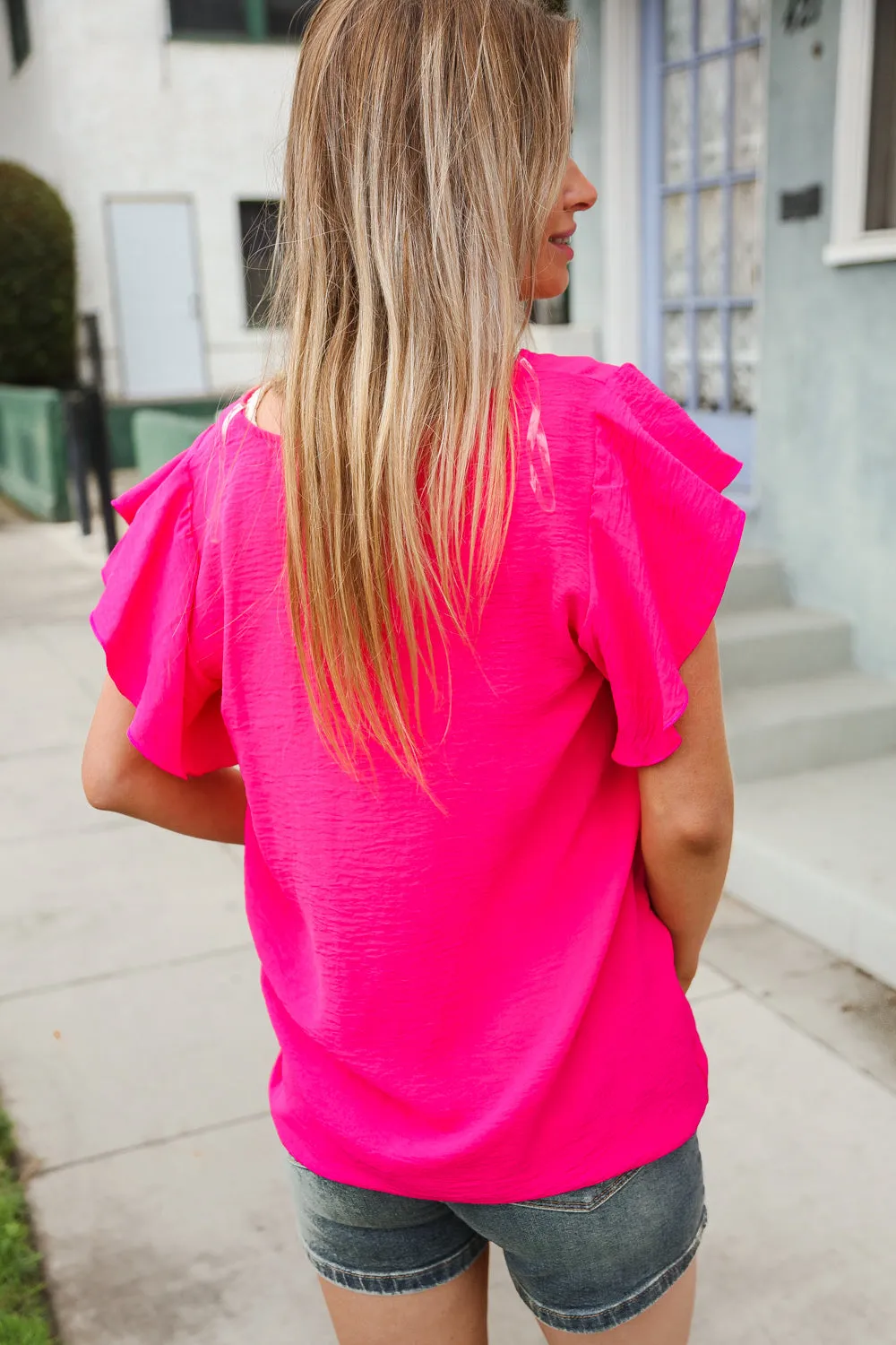 You Got This Solid Fuchsia Textured Flutter Sleeve Blouse sold by Charming Charlie product image thumbnail 2