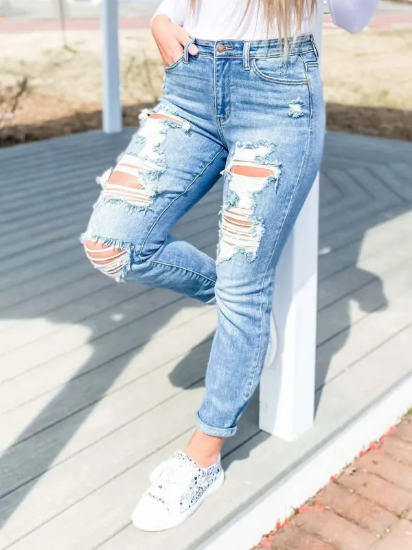 Distressed Skinny Jeans sold by Charming Charlie