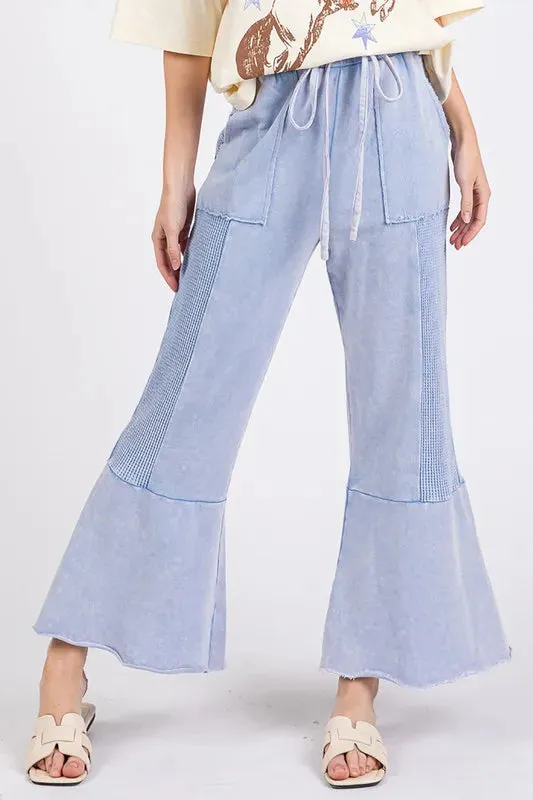 SAGE+FIG Vintage Washed Flared Panel Pants sold by Charming Charlie