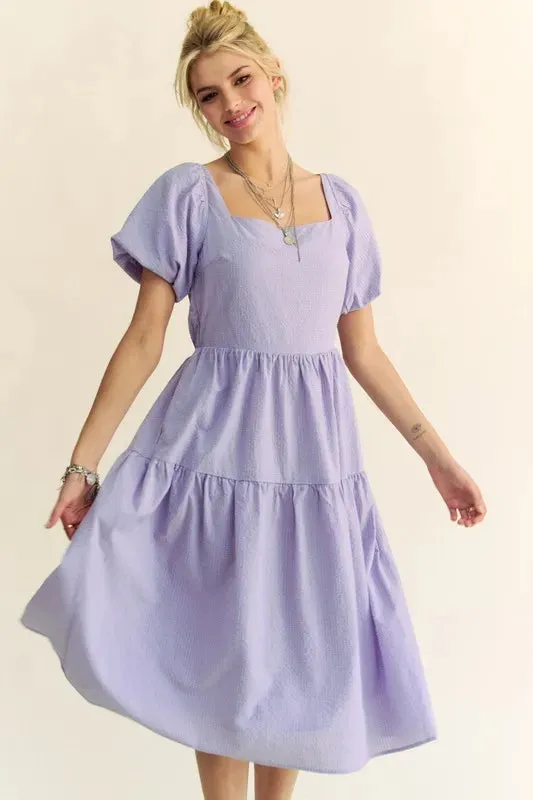 Davi & Dani Textured Fabric Short Puff Sleeve Midi Dress sold by Charming Charlie
