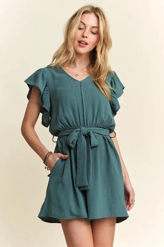 ADORA Ruffle Sleeves Romper with Pockets sold by Charming Charlie