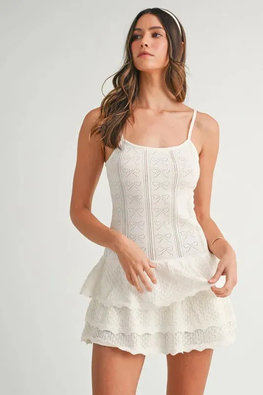 MABLE Bow Pointelle Knit Ruffle Mini Dress sold by Charming Charlie