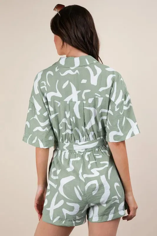 VERY J Oversized Printed Button Down Resort Romper sold by Charming Charlie product image thumbnail 3