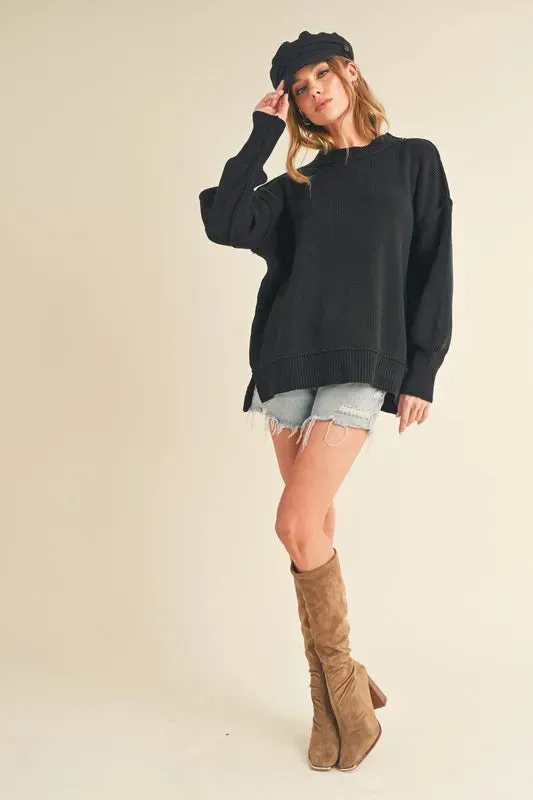 Aemi+Co Ribbed Hem Side Slit Round Neck Sweater sold by Charming Charlie